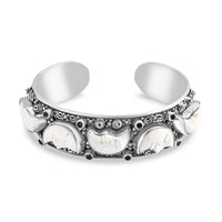 Bali Legacy Carved Bone and Blue Topaz 1.20 ctw Moon Cuff Bracelet in Sterling Silver (8.00In)