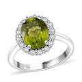 Hebei Peridot and White Zircon 3.40 ctw Halo Ring in Rhodium Over Sterling Silver (Size 10.0) - Sticky add to cart bar