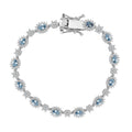 Santa Maria Aquamarine and Moissanite 3.25 ctw Bracelet in Rhodium Over Sterling Silver (6.50 In) - Sticky add to cart bar
