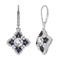 120 Faceted Moissanite (Rnd 6 mm), Blue Sapphire Earrings in Rhodium Over Sterling Silver 2.70 ctw - Sticky add to cart bar