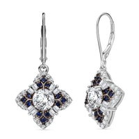 120 Faceted Moissanite (Rnd 6 mm), Blue Sapphire Earrings in Rhodium Over Sterling Silver 2.70 ctw
