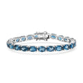 Premium London Blue Topaz 25.10 ctw Ocean Symphony Bracelet in Rhodium Over Sterling Silver (6.50 In) - Sticky add to cart bar