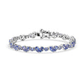 D'Joy Tanzanite 7.65 ctw Heart Bracelet in Rhodium Over Sterling Silver (7.25 In) - Sticky add to cart bar