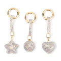 Livmore Black Glass and Crystal 3-piece Set Heart, Star and Ball Keychain in Goldtone - Sticky add to cart bar