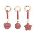 Livmore Black Glass and Crystal 3-piece Set Heart, Star and Ball Keychain in Goldtone - Sticky add to cart bar