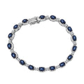 D'Joy Blue Star Sapphire (DF) and Moissanite 12.15 ctw Bracelet in Rhodium Over Sterling Silver (6.50 In) - Sticky add to cart bar