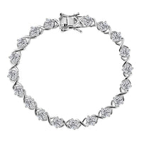D'Joy Moissanite (Rnd 5mm) XOXO Bracelet in Rhodium Over Sterling Silver (7.25 In) 9.00 ctw