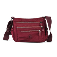 La Marey Dark Purple Nylon Crossbody Bag (10.6"x3.9"x7.9")
