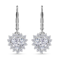 D'Joy Blue Moissanite (Hrt 6mm), Blue Sapphire Heart Earrings in Rhodium Over Sterling Silver 2.10 ctw