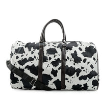 La Marey Black and White Cow Pattern Faux Leather Duffel Bag
