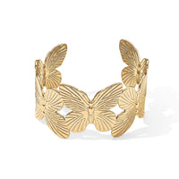 Butterfly Bangle Bracelet in ION Plated YG Stainless Steel (6-7In)