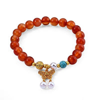Red Agate, Turquoise Bracelet in Goldtone (6.00-6.50In) 79.00 ctw