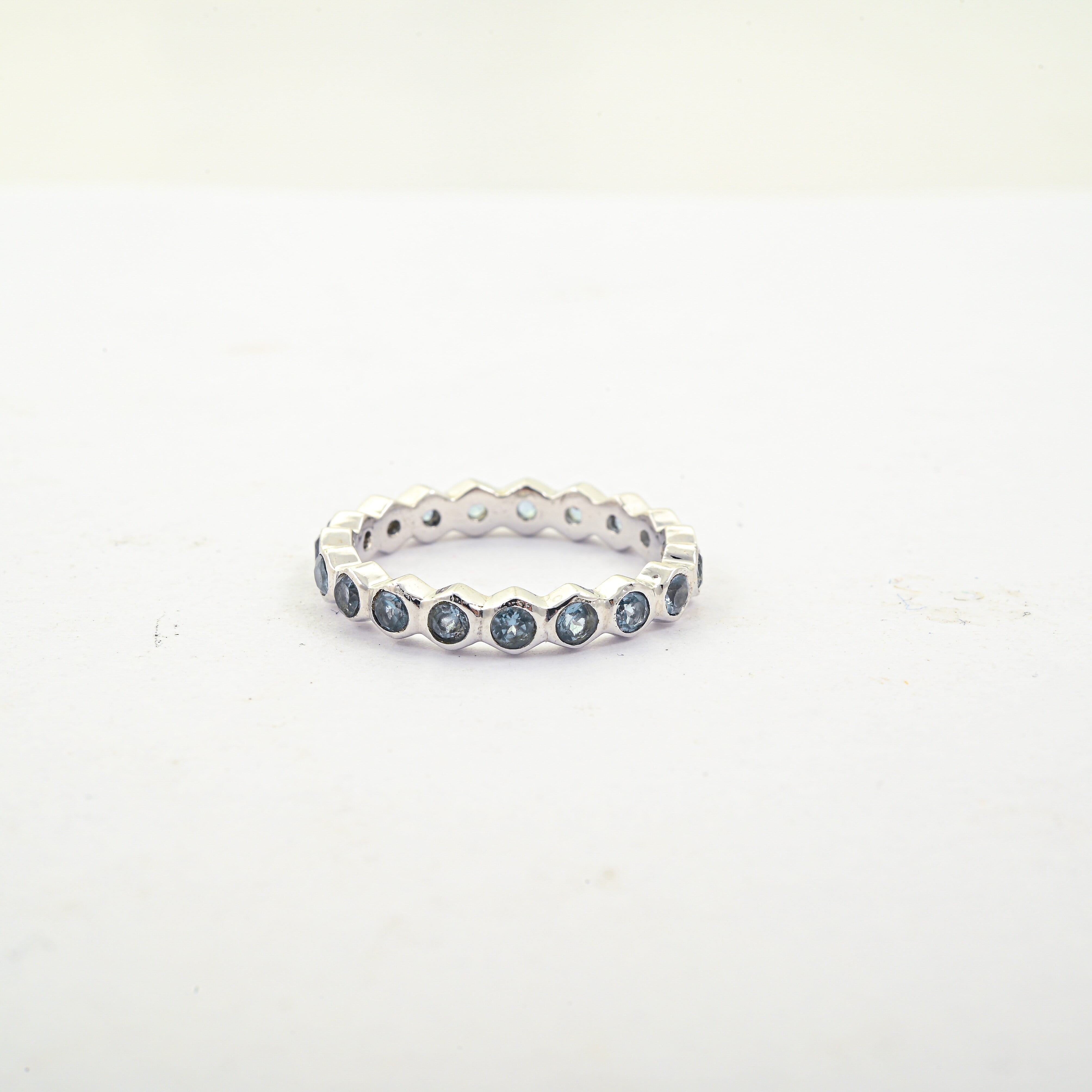 Blue Topaz 0.30 ctw Eternity Ring in Sterling Silver (Size 5.0)