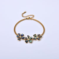 Abalone Shell and Simulated Diamond Bracelet in ION Plated YG Stainless Steel (7-9In)