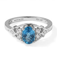 D''Joy London Blue Topaz and White Zircon 1.20 ctw Ring in Rhodium Over Sterling Silver (Size 10.0)