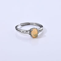 Opal and Simulated Diamond 0.60 ctw Ring in Silvertone (Adjustable)