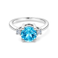 Blue Topaz and Simulated Diamond 1.94 ctw Ring in Sterling Silver (Size 7.0)