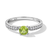 Hebei Peridot and Simulated Diamond 0.53 ctw Ring in Sterling Silver (Size 7.5)