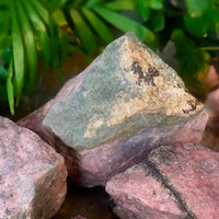 Natural Rhodonite with Aquamarine Inclusions 5-6" Approx 3225Ctw